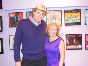 Calvin Schwartz with Beverly Beveridge (Director of Public Relations, FMC Productions NYC) also a study in the color purple.