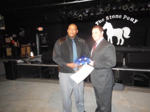 in an emotional ceremony, Richard DeRose, Regional Director in Governor Christie's Office of Intergovernmental Affairs presented Nick Clemons with the flag that flew over the State House in his father, Clarence Clemon's honor on Fri Jan 11th. 