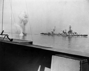  A-heavy-German-coast-artillery-shell-falls-between-USS-Texas-and-USS-Arkansas-while-the-two-battleships-engage-Battery-Hamburg.