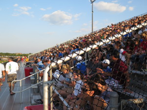 huge crowd and cumulous clouds